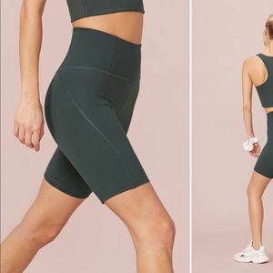 Girlfriend Collective bike shorts in Moss